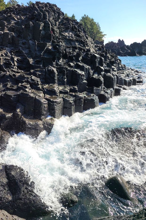 Hexagonal rocks at Daepo Jusangjeolli Cliff on Jeju Island