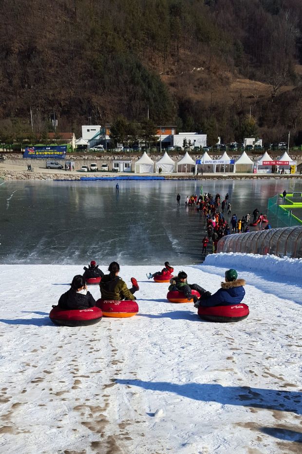 People sledding at Hwacheon Ice Festival Korea