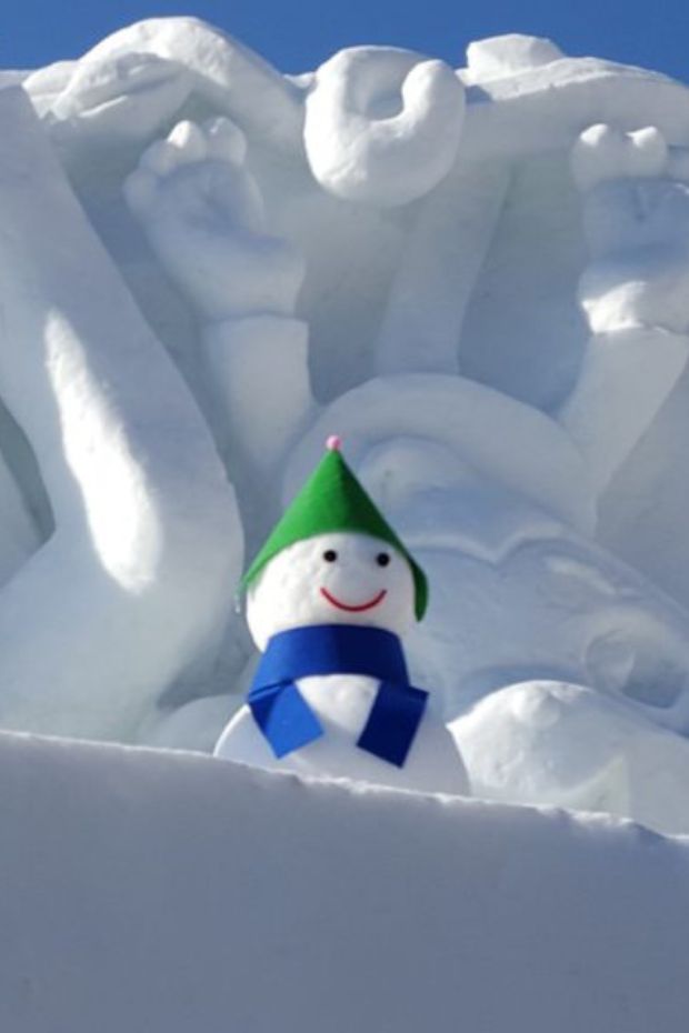 Snowman and snow sculpture
