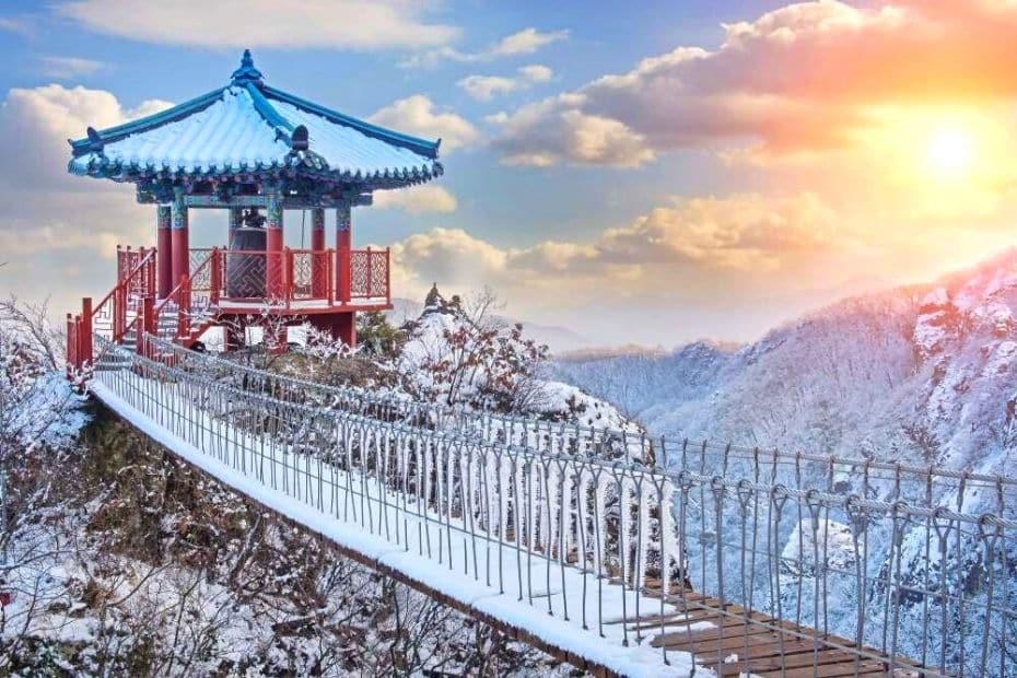 Korean pagoda covered in snow in the mountains