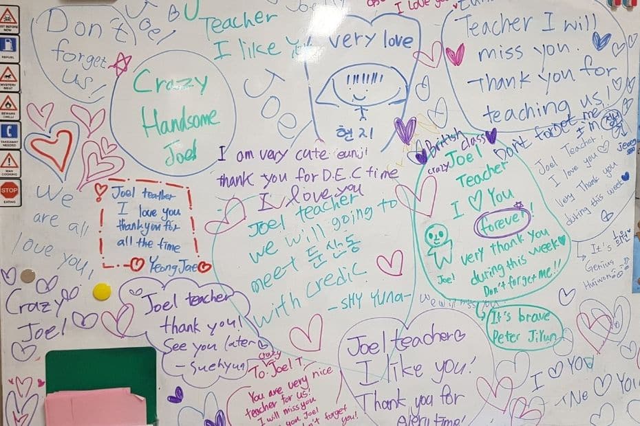 White board with lots of messages from students