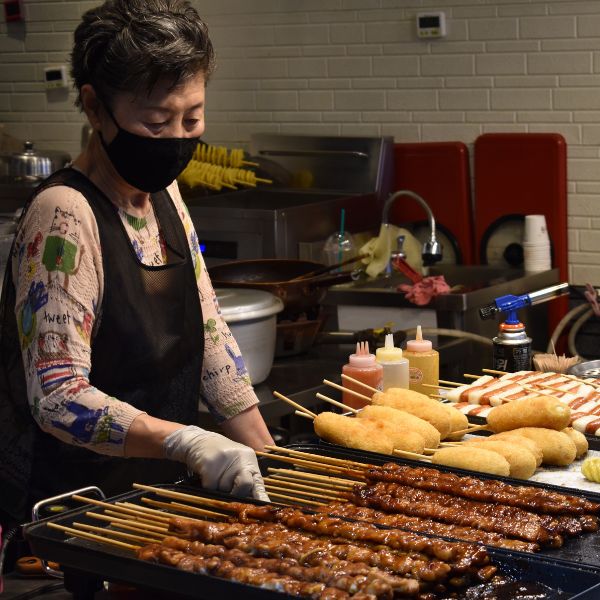 Woman cooking Korean street food